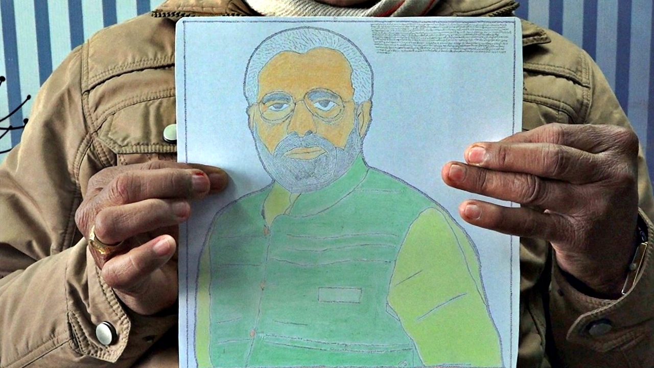 PM Modi portrait with miniature writing