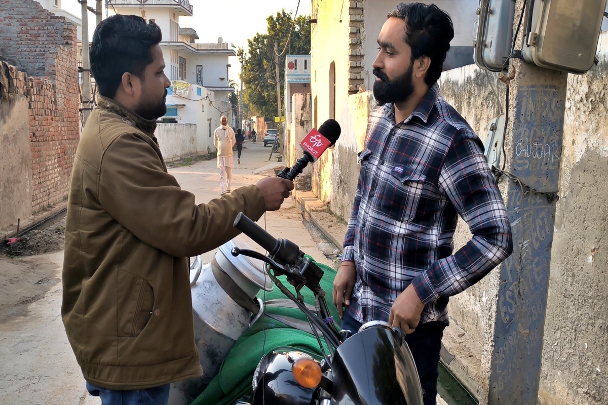 man selling milk on harley davidson bike in faridabad