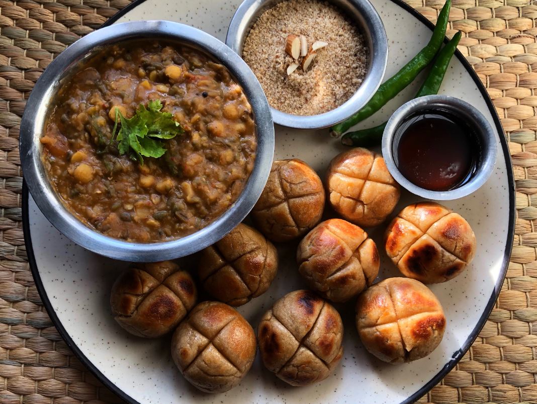 Three foods go into making this Rajasthani staple - Dal (lentil), Bati (hard bread), and Churma (wheat cooked in ghee and sugar), and the trio of foods all provide their own unique taste to make for a wholesome and toothsome delicacy. (ANI)