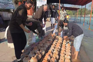 UNCLAIMED BONES IMMERSED GANGA