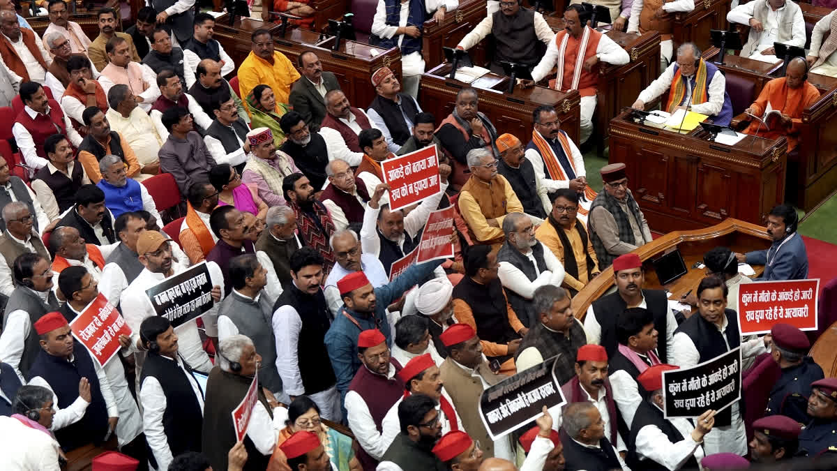 Samajwadi Party leaders protest during the joint sitting of both Houses addressed by Uttar Pradesh Governor Anandiben Patel, marking the beginning of the state Assembly budget session, in Lucknow, Tuesday, Feb. 18, 2025.