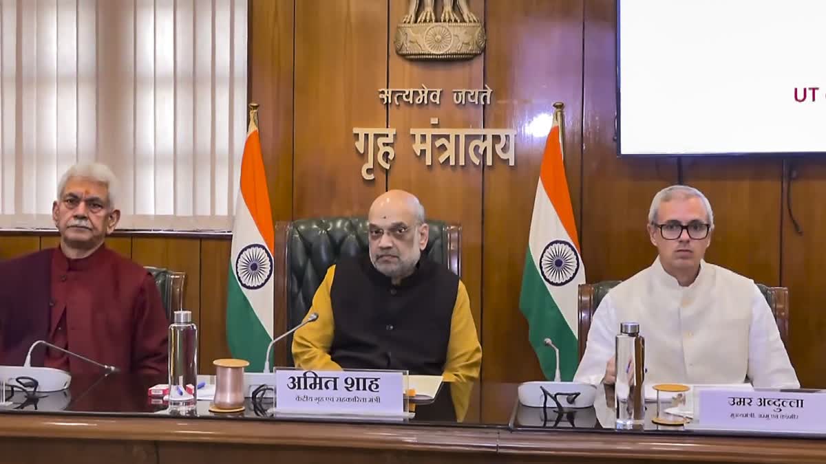 Union Home Minister Amit Shah reviews the status of the implementation of new criminal laws in Jammu and Kashmir in the presence of Chief Minister Omar Abdullah and Lieutenant Governor Manoj Sinha, in New Delhi, Tuesday, Feb. 18, 2025.