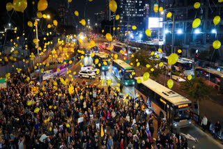 Relatives and supporters of Israelis held hostage by Hamas in Gaza release balloons to mark the 500 days of captivity and demand their release in Tel Aviv, Israel, on Monday, Feb. 17, 2025.