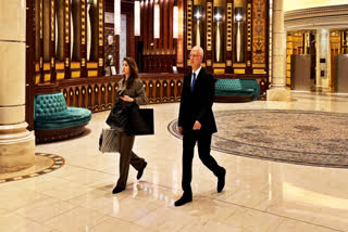 Kirill Dmitriev, the head of the Russian Direct Investment Fund, right, walks with an unidentified member of his team across the Ritz Carlton hotel in Riyadh, Saudi Arabia, Tuesday, Feb. 18, 2025.