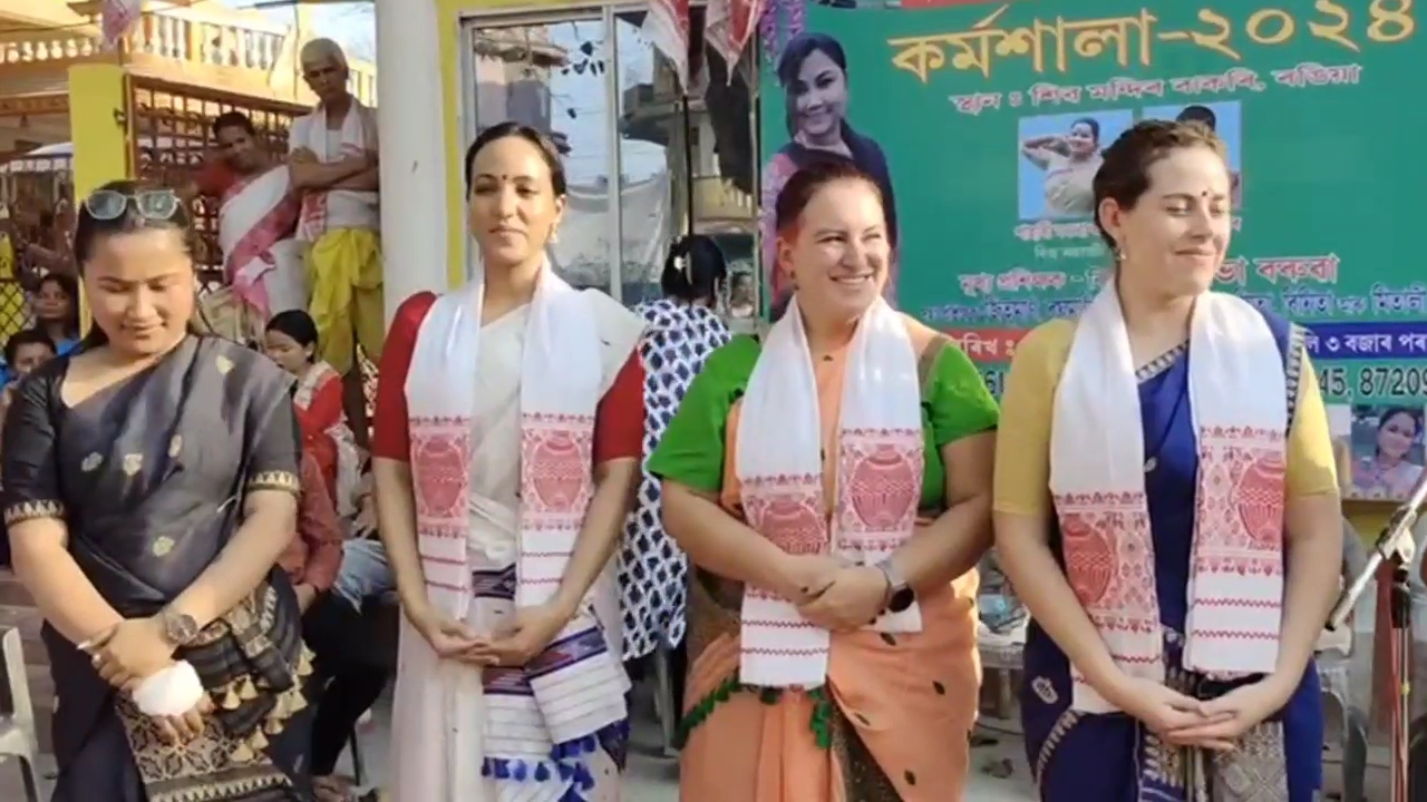 Foreign young girls busy dancing Bihu in Rangia