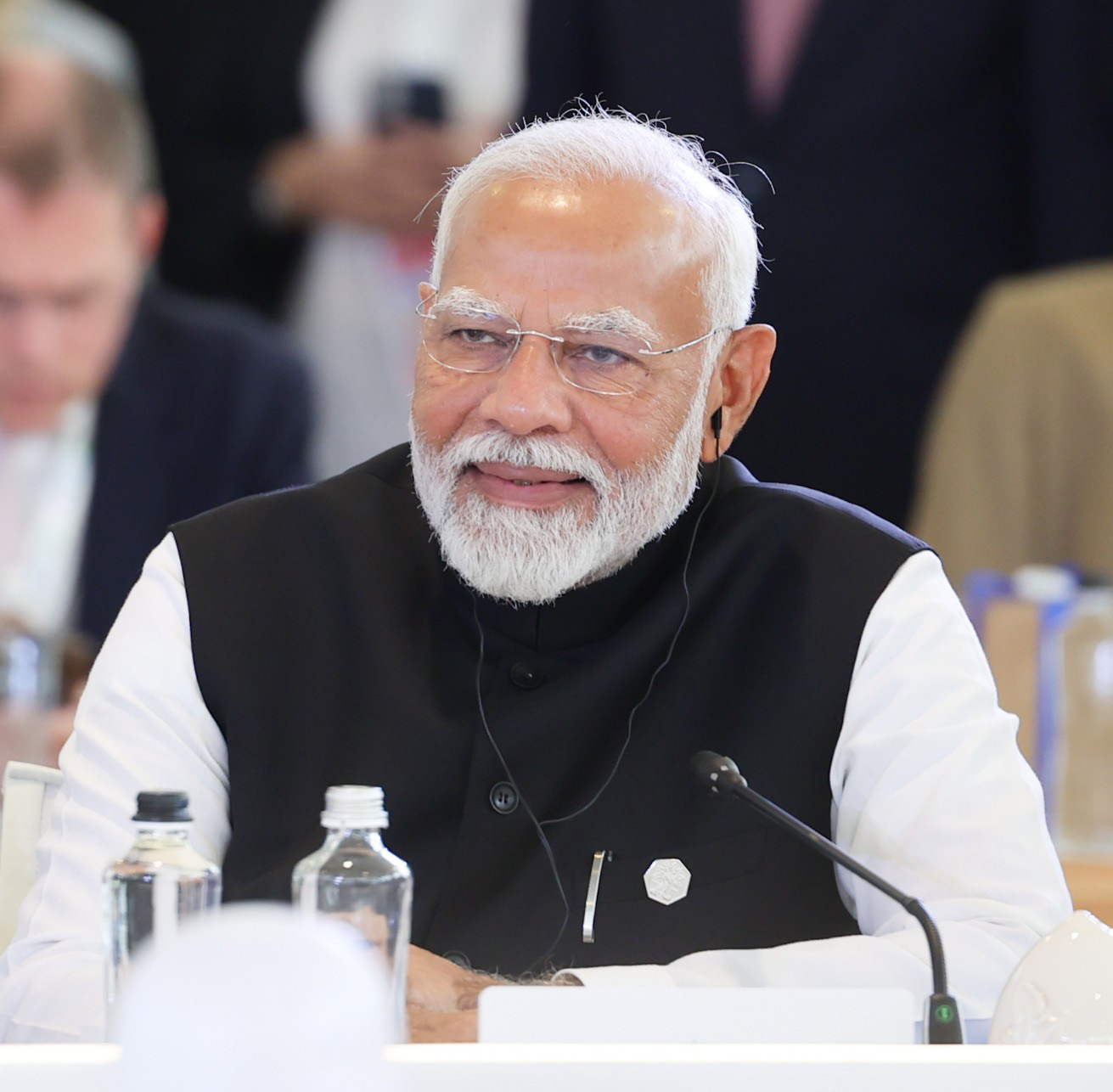 Prime Minister Narendra Modi has formed his maiden coalition government with the help of his allies - the Telugu Desam Party (TDP) and Janata Dal (United) (JDU). Both partners are seeking a lion's share which is likely to curtail the flamboyant characteristic that’s typical of brand Modi.