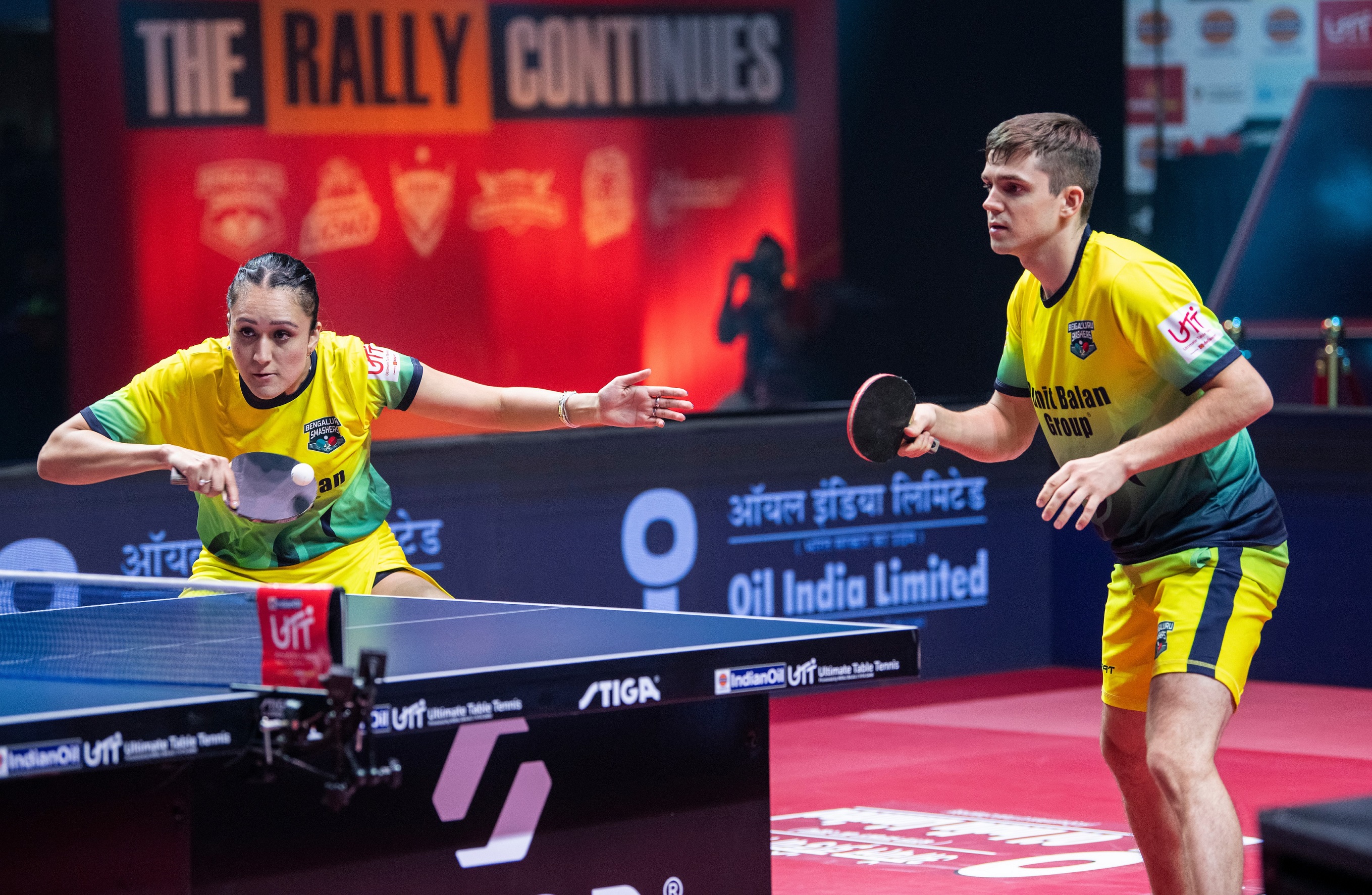 Manika Batra and Kirill Gerassimenko of Bengaluru Smashers in action during the mixed doubles match of the Ultimate Table Tennis tie in Pune on Tuesday.