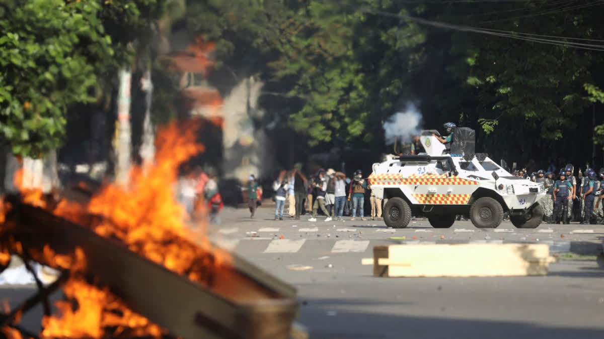 Police fire tear gas shells and rubber bullets to disperse students shouting slogans in favor of quota system in public service at the university campus, in Dhaka, Bangladesh, Wednesday, July 17, 2024.