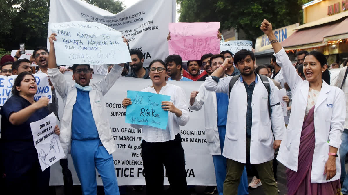 Doctors stage a protest against the sexual assault and murder of a postgraduate trainee doctor at Kolkata RG Kar Hospital, in New Delhi on Saturday.