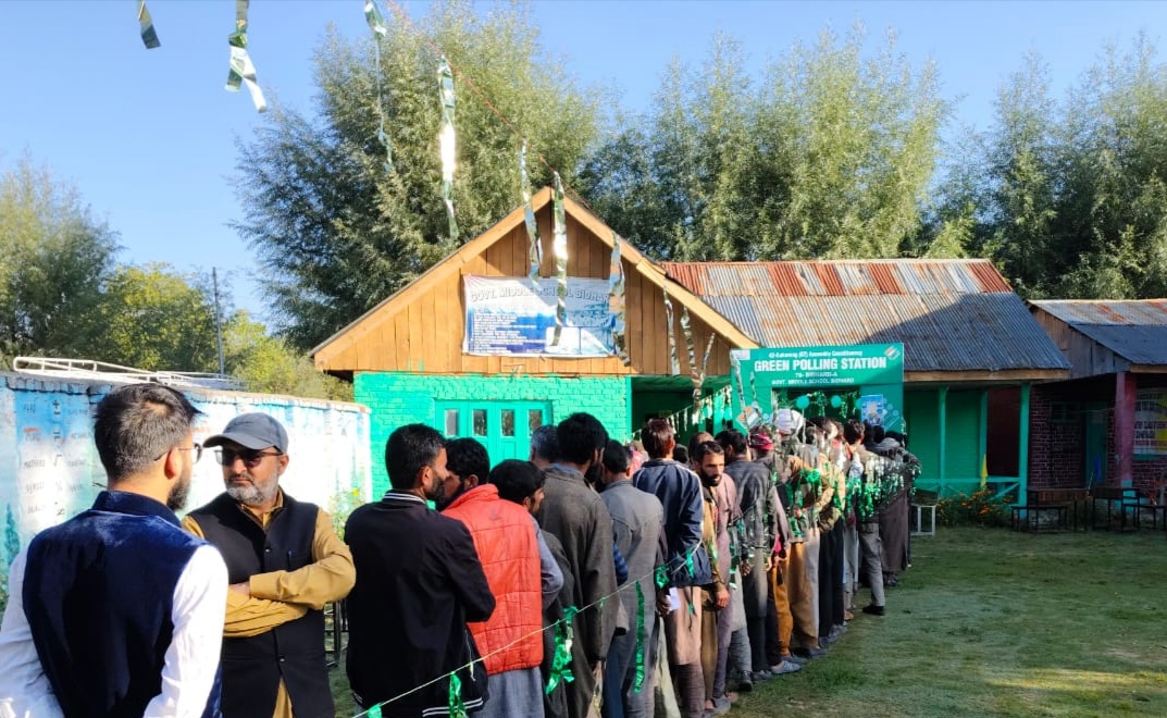 Voters queue up outside a polling station to cast vote in the first phase of J-K assembly election in Kokernag, Anantnag on Wednesday, Sept 18, 2024