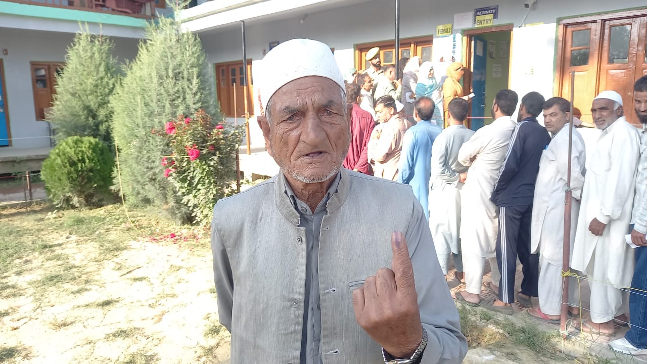 An elderly man shows his inked finger after casting vote in Kashmir on Wednesday, Sept 18, 2024