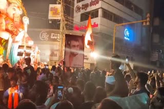 Fan danced holding Darshan's photo