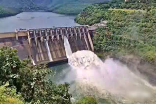 water_releasing_from_srisailam_dam_gate_opened