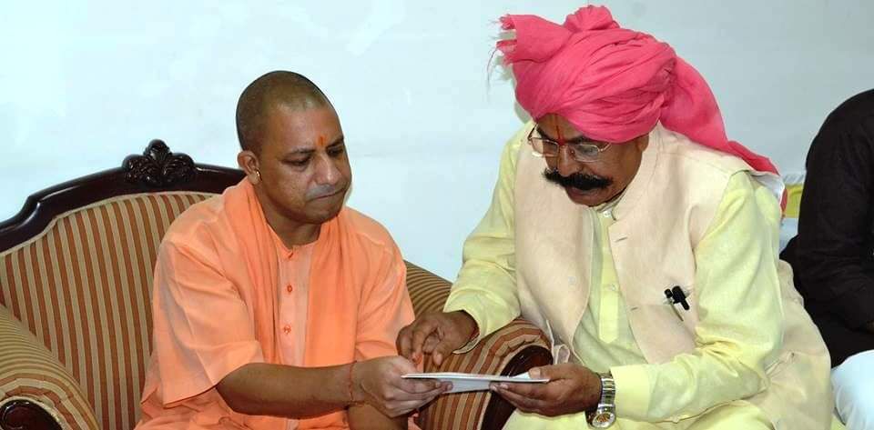 Former Uttar Pradesh minister and MLA Fatehpur Sikri Chaudhary Udaybhan Singh with CM Yogi Adityanath