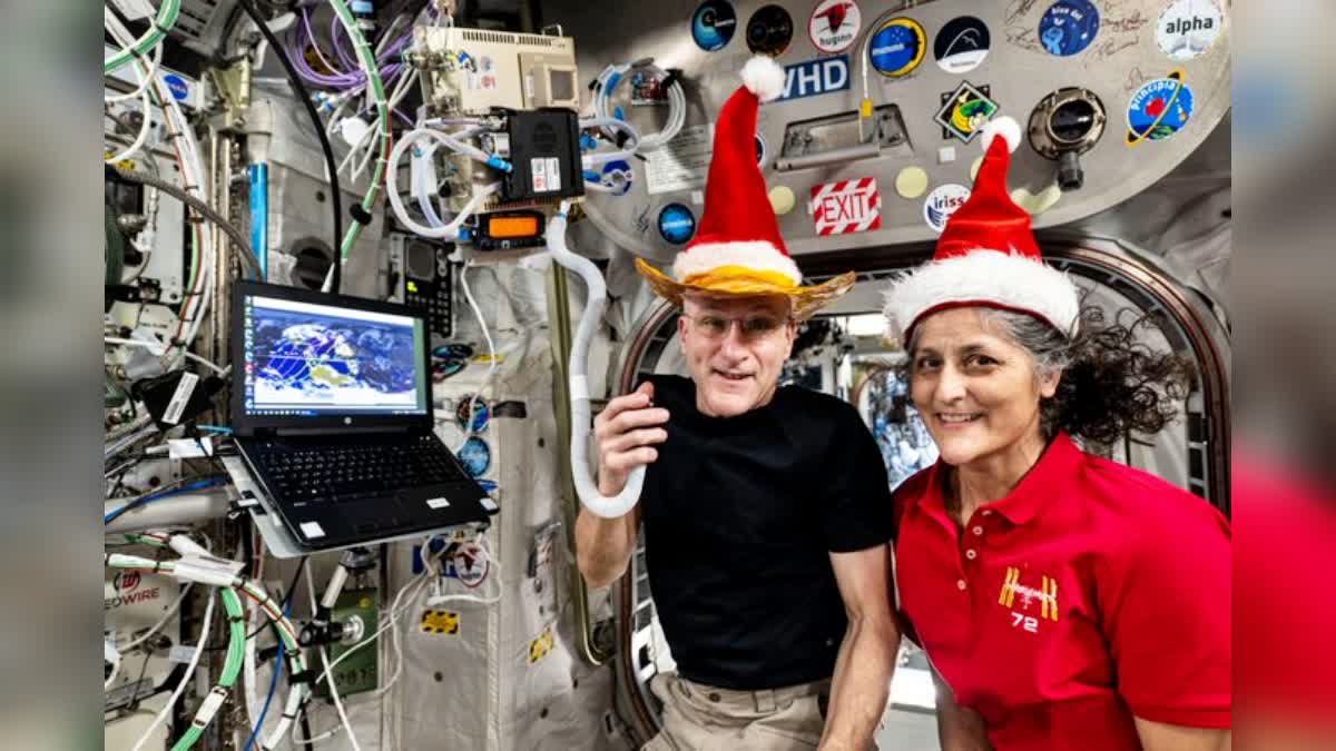 SUNITA TO CELEBRATE CHRISTMAS  ASTRONAUT SHARES SANTA HAT SELFIE  SANTA HAT SELFIE  SUNITA WILLIAMS AND BUTCH WILMORE