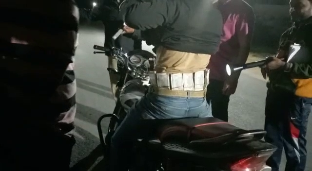 Traveling on a bike with money tied around waist