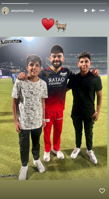 kohli with sehwag sons