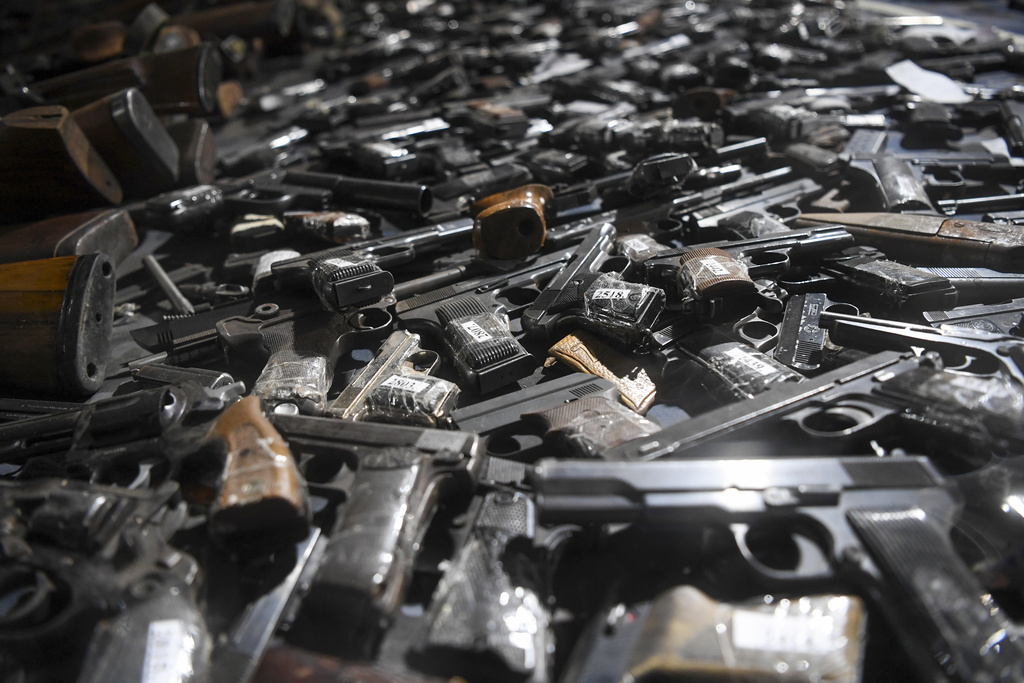 Weapons collected as part of an amnesty are displayed in a warehouse near the city of Smederevo, Serbia, Sunday, May 14, 2023.