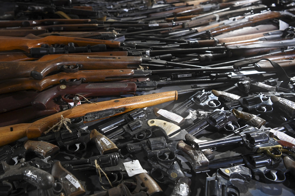 Weapons collected as part of an amnesty are displayed in a warehouse near the city of Smederevo, Serbia, Sunday, May 14, 2023.