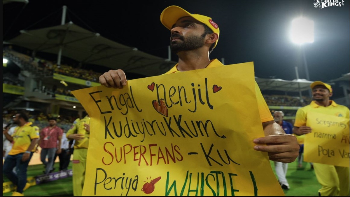 Rahane with banner