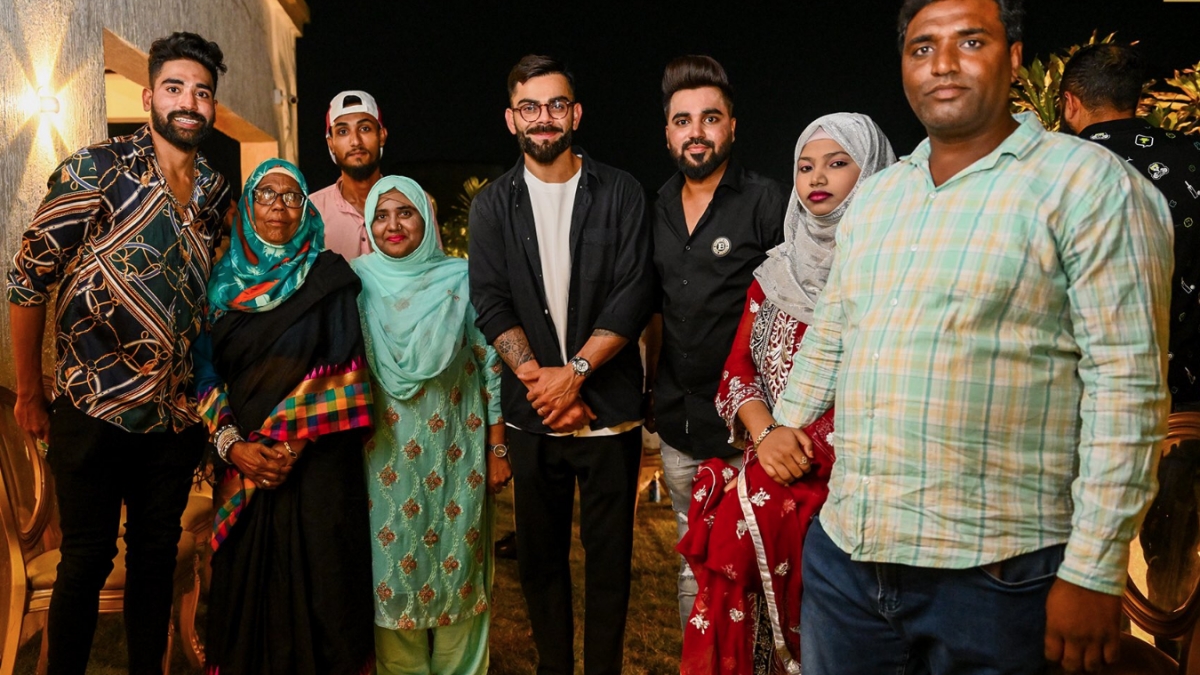 Virat Kohli with Mohammad Siraj family