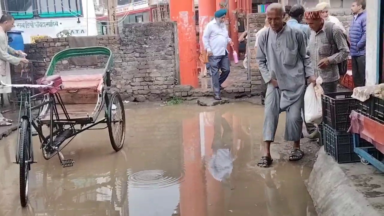 Roads filled with water after rain in Paonta Sahib.