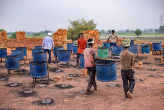 Labourers working on the site (Source: Getty images)