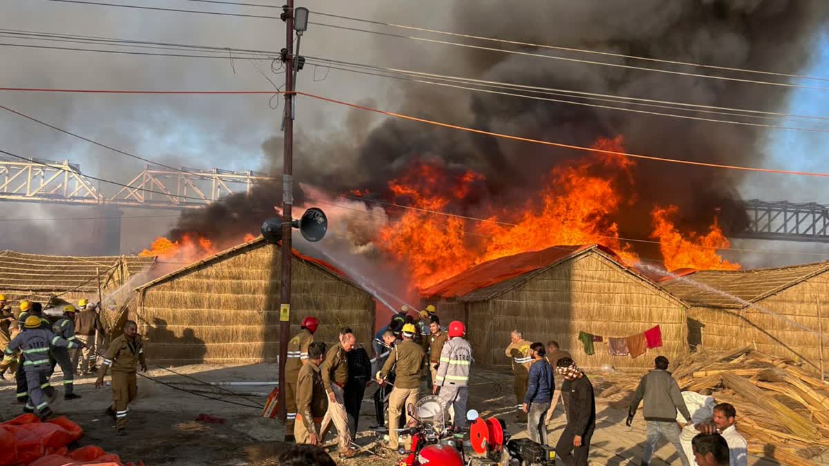 Smoke billows out after a fire broke out in a camp during Mahakumbh, at Sangam in Prayagraj, Sunday, Jan. 19, 2025