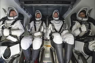 Astronauts return from space