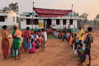 Voters queue up outside a polling station in Bastar during the first phase of Lok Sabha election 2024