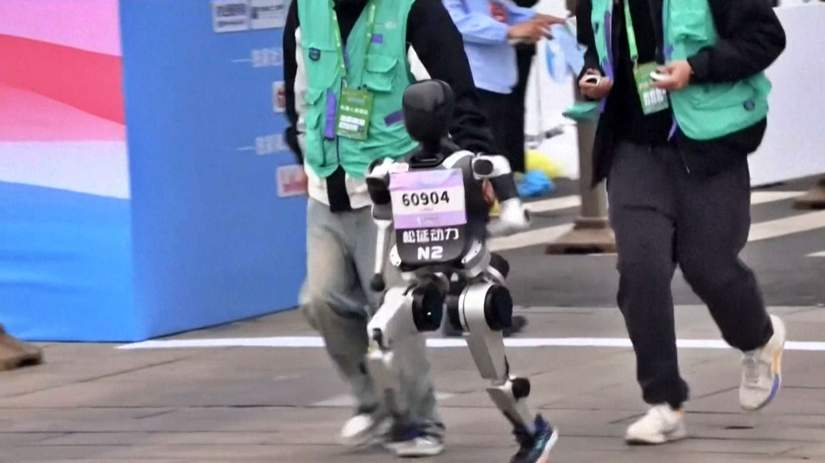 HUMANOID ROBOTS CHINA IN AI TECHNOLOGY HUMANOID ROBOTS RACE HUMANOID ROBOT MARATHON IN CHINA