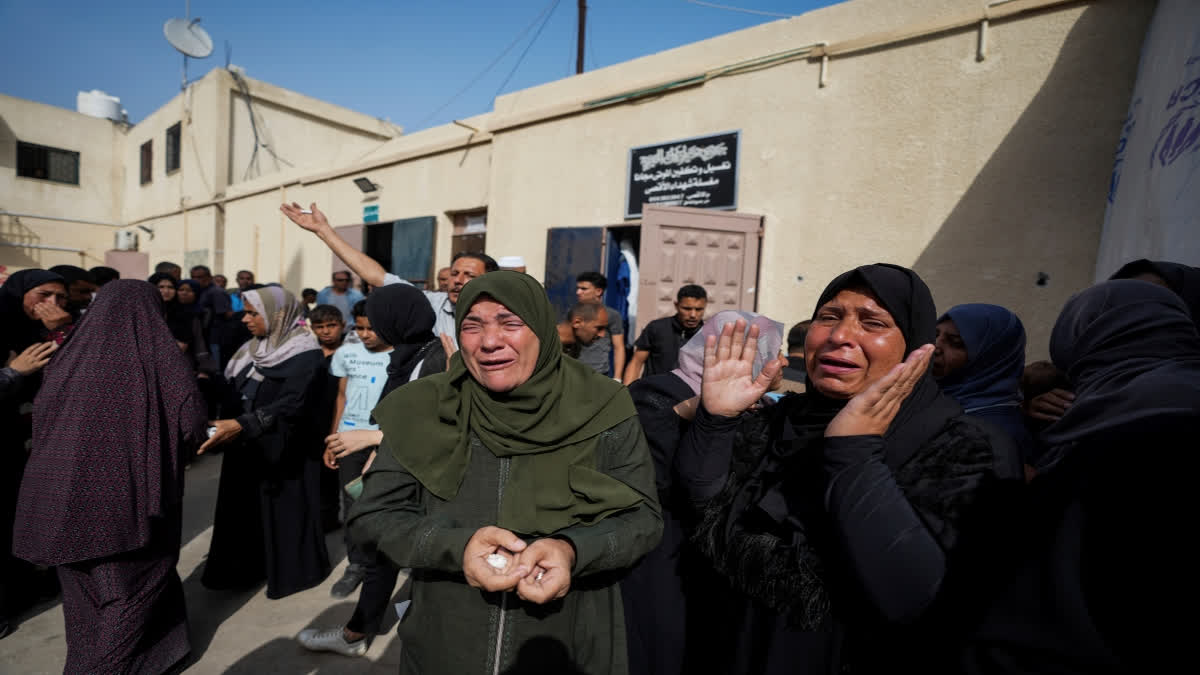 An Israeli airstrike killed 20 people in central Gaza, mostly women and children, and fighting raged across the north on Sunday as Israel's leaders aired divisions over who should govern Gaza after the war, now in its eighth month.