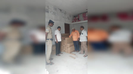 Photo of Revenue officials inspecting a firecracker shop