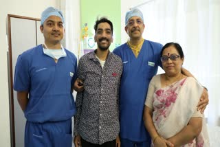 Doctors team with patient