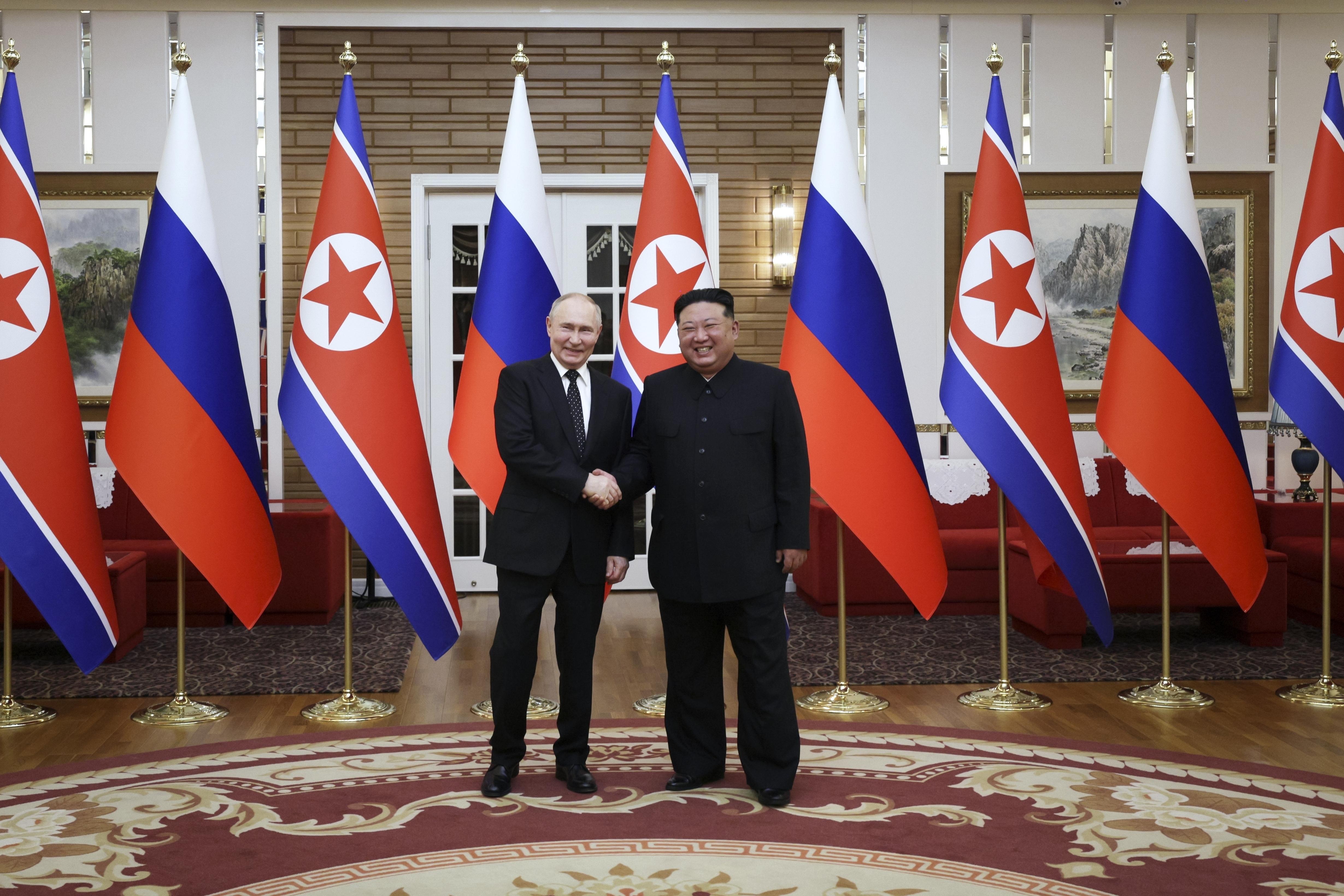 Putin and Kim Jong Un