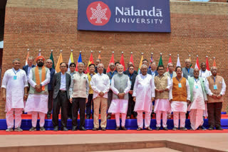 Prime Minister Narendra Modi in a group photo with Bihar CM Nitish Kumar, EAM Dr S Jaishankar and others during the inauguration of the new campus of Nalanda University in Bihar on Wednesday