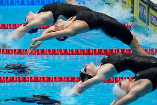 American competitive swimmer Regan Smith set a world record in the women's 100-meter backstroke, touching the finishing line in 57.13 seconds at the US swimming trials on Tuesday.