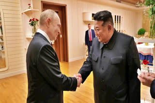 This photo provided Wednesday, June 19, 2024, by the North Korean government, Russian President Vladimir Putin, left, and North Korea's leader Kim Jong Un shake hands at the state guest house in Pyongyang, North Korea, early Wednesday, June 19.