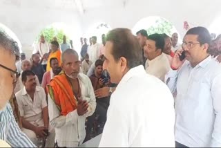 Union MoS External Affairs Kirti Vardhan interacts with locals during his visit to Gonda in Uttar Pradesh