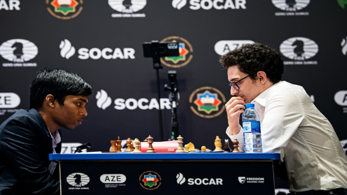 Indian Grandmaster R Praggnanandhaa held fancied American player Fabiano Caruana to a draw in the first game of the semifinals of the FIDE World Cup chess tournament here on Saturday.