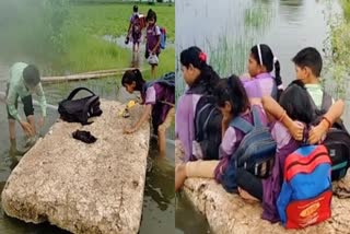 School going children cross water by sitting on thermocol