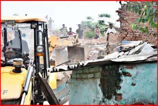 Bulldozer action on drug smugglers house