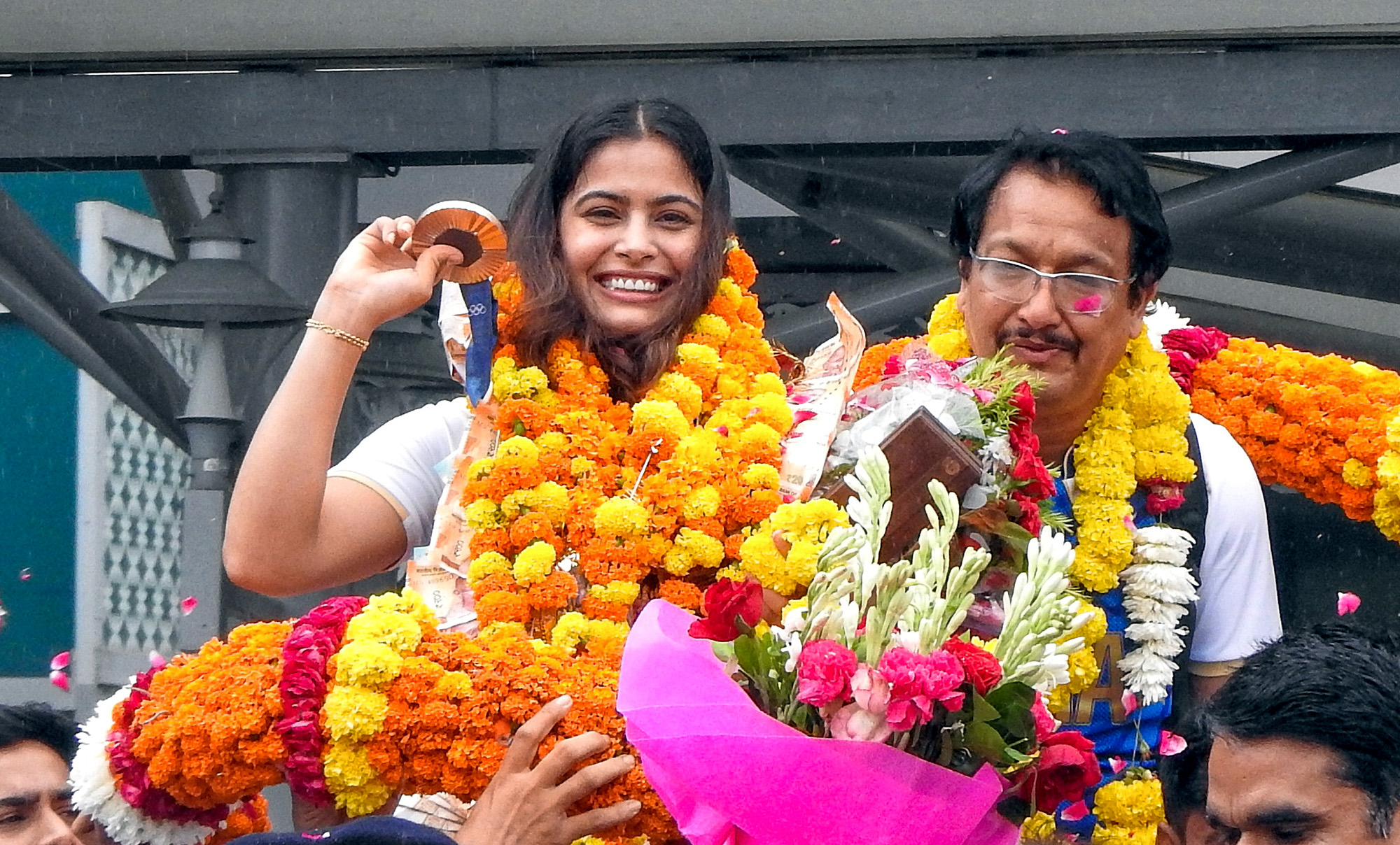 Manu Bhaker and coach Jaspal Rana