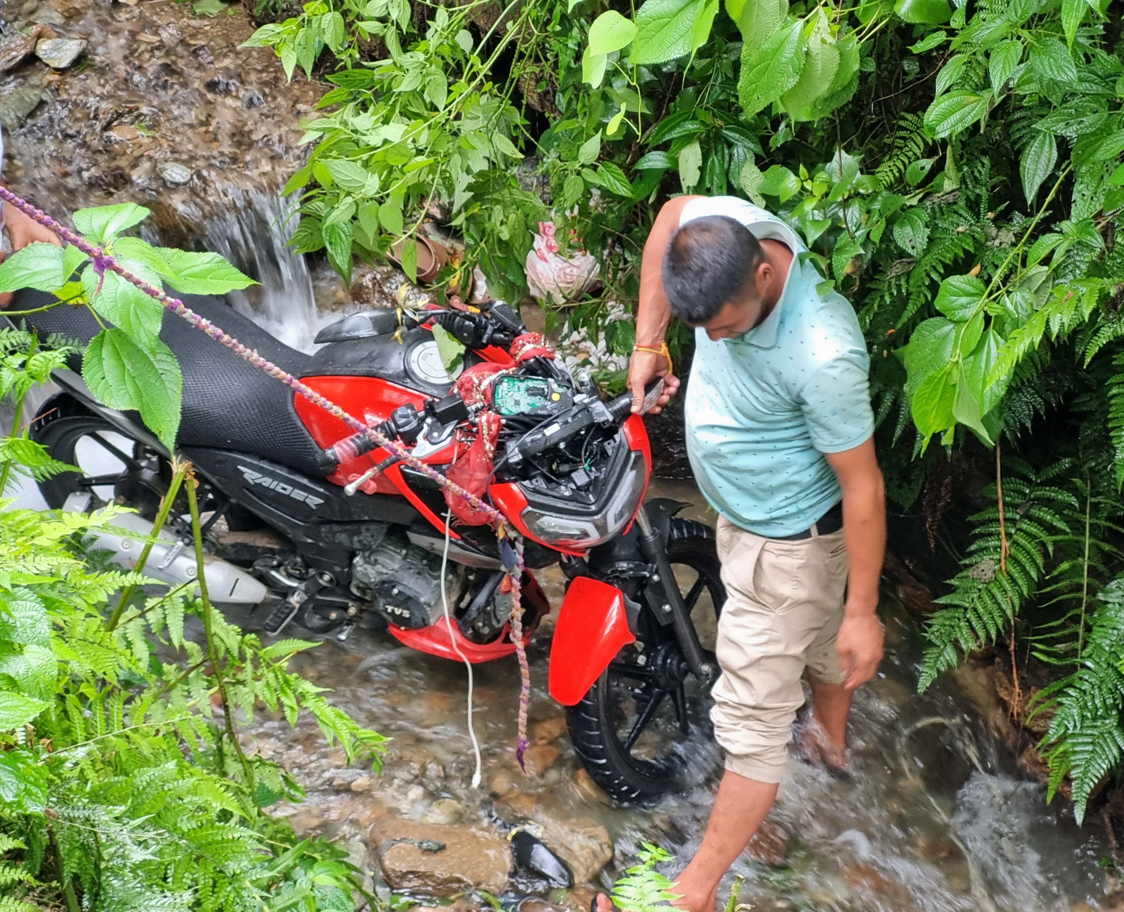 Bike Rider Fell into Stream