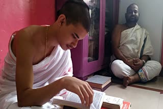 A boy writes the Sanskrit Shastra exam 'Tenali Pariksha' in Goa