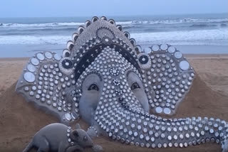 Ganesh Chaturthi 2023 is being celebrated all over India with pomp and gaiety. Sand artist Sudarshan Patnaik has setup a steel infused Ganesha idol on a Puri beach using 100 kg of steel and 6 tons of sand.