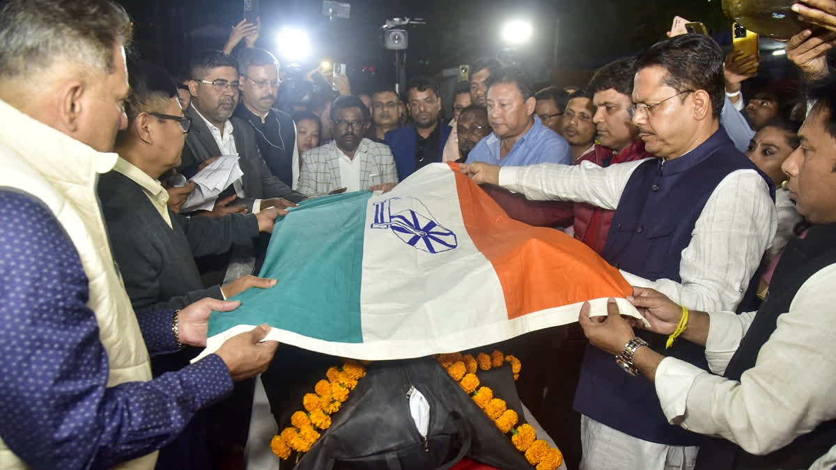 Assam Congress President Bhupen Borah pays his last respects to party leader Mridul Islam, who allegedly died due to tear gas smoke during a protest on Wednesday, in Guwahati, Wednesday, Dec. 18, 2024.