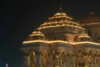 Ayodhya is reviving its religious spirit with the opening of a new PSU bank branch along Ram Path. The branch, named 'Ramjanmabhoomi', features ornate lampposts, canopies, and a banner featuring the Ram temple and the bank's name. A redeveloped road, Ramjanmabhoomi Path, leads to a hoarding featuring the Ram temple, city skyline, and Lord Ram holding his bow.