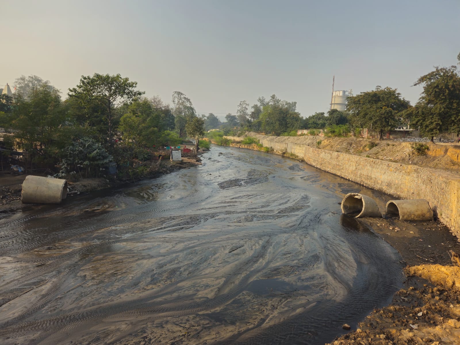 Tribal Baiga thirst with drain water