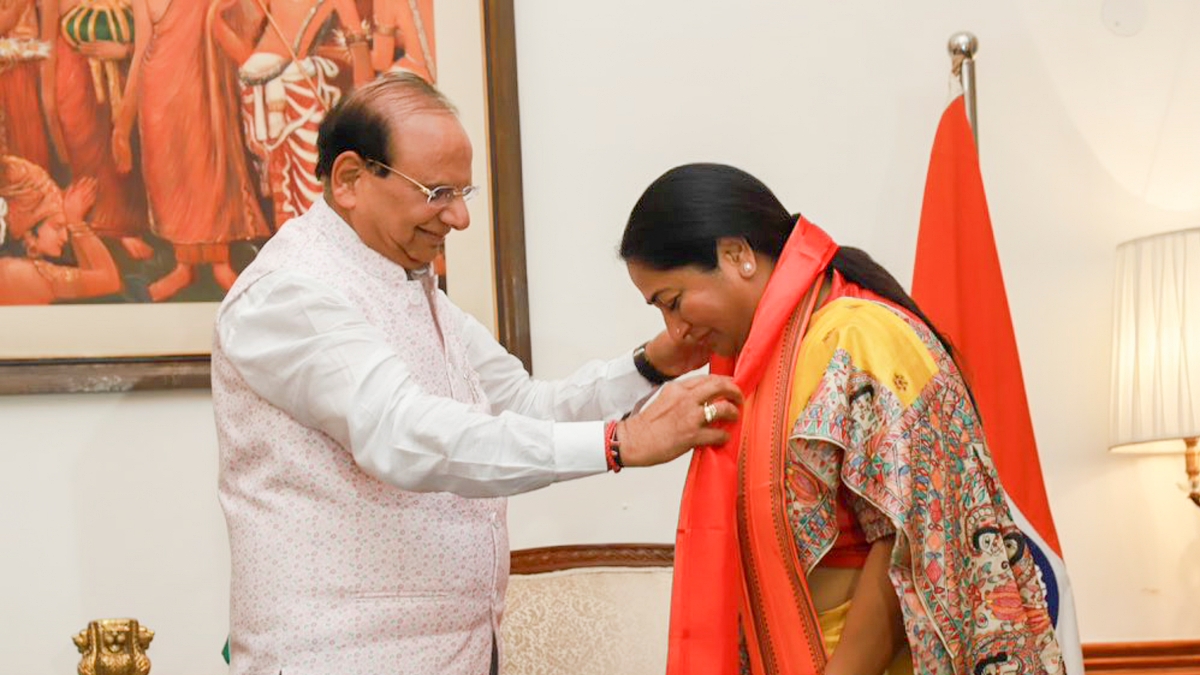 In this image posted by @LtGovDelhi via X on Wednesday, Feb. 19, 2025, Delhi Lieutenant Governor V K Saxena felicitates BJP leader and Chief Minister-designate Rekha Gupta during a meeting at the Raj Niwas, in New Delhi.